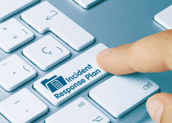 incident response plan - inscription on blue keyboard key.