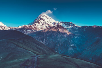 Wall Mural - panoramic landscape of snow-capped mountain kazbek