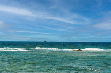 Panorama with a ship sailing on the sea