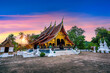 © tawatchai1990 - Wat Xieng Thong (Golden City Temple) at sunset in Luang Prabang, Laos.