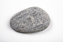 Gray, Oval Stone On A White Background