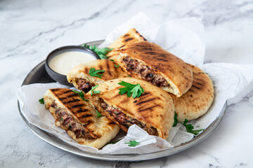 arayes- pita bread filled with a mixture of minced meat with different spices