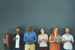 © Tamani Chithambo/peopleimages.com - Many diverse business people working with technology devices, digital marketing, collaborating online on grey copy space. Group connecting to global networking, advertising social community and unity