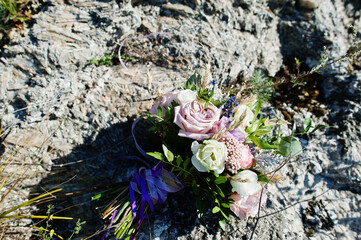 Wall Mural - Beautiful tender wedding bouquet and rings.