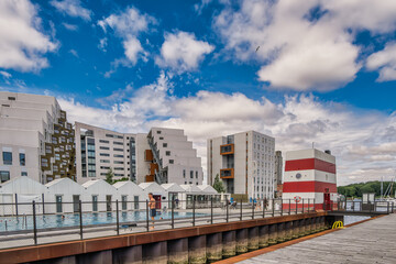 Wall Mural - Reconstructed modernized homes in the Odense old harbor, Denmark