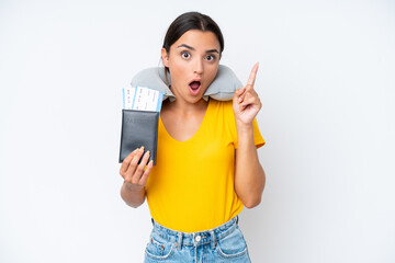 Poster - Woman with Inflatable Travel Pillow over isolated background intending to realizes the solution while lifting a finger up