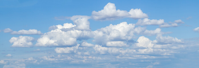 Wall Mural - White cloud on a sunny day. Nature background.