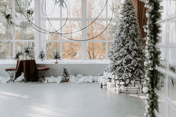 Stylish room interior with beautiful Christmas tree and decorative fireplace