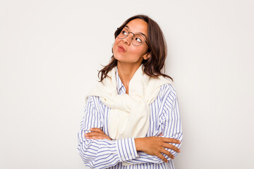 Wall Mural - Young hispanic woman isolated on white background dreaming of achieving goals and purposes