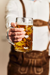 Wall Mural - Mann mit Bierkrug in Tracht