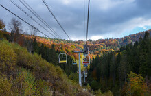 Mountain Landscape With Chairlift On Autumn Forest Background. Carpathian Mountains, Ukraine 