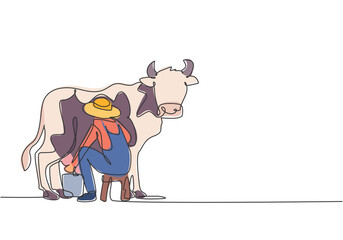 Wall Mural - Single continuous line drawing young male farmer milking a cow with traditional way. A successful harvest activity minimalism concept. Dynamic one line draw graphic design vector illustration.