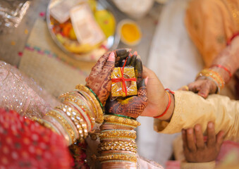 Father performing Kanyadan ritual during Indian wedding 