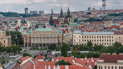 Wall Mural - Beautiful View On Prague In Czech Republic panoramic timelapse With Flowing River Vltava, manes bridge, Church of our lady before Tyn And With Zizkov Television Tower In Background. View from above