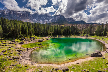 Wall Mural - majestic aerial view of carezza lake in dolomites