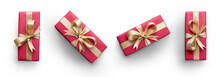 Top View Of Christmas Presents Wrapped In Red Paper With Gold Ribbon And Bow Decoration Isolated Against A Transparent Background.
