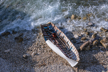 Canvas Print - Old boat on Ionian Sea coast in Corfu town, Corfu Island, Greece