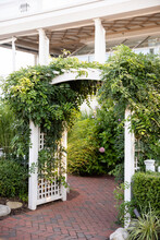 White Arched Garden Entrance