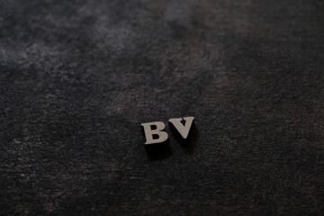 Wall Mural - the letters b and v above the dark field. initials bv