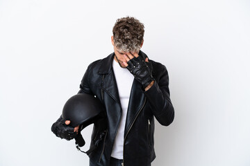 Canvas Print - Young man with a motorcycle helmet isolated on white background with tired and sick expression