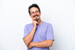 © luismolinero - Young man with moustache isolated on white background thinking an idea while looking up