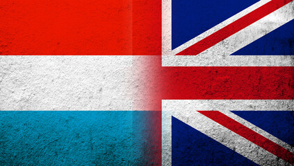 Wall Mural - National flag of United Kingdom (Great Britain) Union Jack with Luxembourg National flag. Grunge background