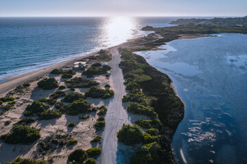 Canvas Print - Road on a land strip between Korission Lake and Ionian Sea, Corfu Island, Greece