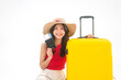 © dodotone - Portrait of young adult southeast asian woman with yellow travel luggage and passport on white isolated background