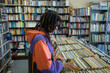 © rushay - Woman seen searching through vinyl records