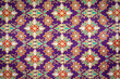 Closeup flower on batik sarong pattern background in Thailand