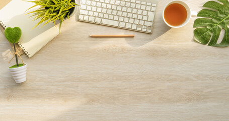 Fototapete - Flat lay of top view desk work table with Coffee computer notebook and pencil work space in minimal wood warm tone concept includes copyspace for add text or graphic