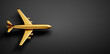 Golden Plane toy model on black backdrop with copy space - 3D Illustration