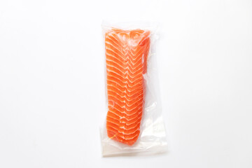 Fresh salmon fillet in vacuum package isolated on white background for delicious salmon steak. 