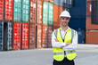 © Boonkung - Portrait Caucasian man worker working in container port terminal. Attractive male engineer people process orders and product at warehouse logistic in cargo freight ship for import export in harbor.