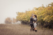 © Olga Mishyna - couple on autumn walk outdoors. Two lovers in autumn park. Love and tender touch. Foggy cloudy day filled with the warmth of love. Beautiful autumn landscape for couple