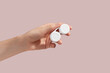 © LeviaUA - Hand holding contact lens case