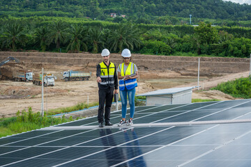 Poster - Technician inspection and repair solar cell on the roof of factory,Service check installation solar cell.