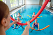 © Kzenon - People in aqua fitness class during a physical therapy session in a physiotherapy center