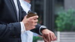 © stockbusters - Confident businessman walking hold coffee downtown. Male hand with cup closeup.