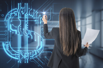 Aufkleber - Back view of young businesswoman using abstract glowing blue circuit dollar hologram on blurry office interior background. Online banking and financial technology concept. Double exposure.