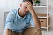 © SHOTPRIME STUDIO - Tired frustrated young man reclines on hand closing eyes think about difficult life decision bad news health problem. Sleepy guy have depression need professional psychology help. Copy space for ad
