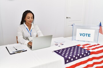 Canvas Print - Young african american woman smiling confident working at electoral college