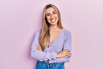 Sticker - Beautiful hispanic woman wearing casual shirt happy face smiling with crossed arms looking at the camera. positive person.