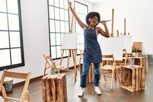 Young African American Woman Smiling Confident Dancing At Art Studio