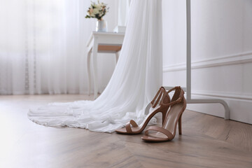 Sticker - High heeled shoes and wedding dress in room