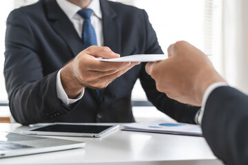 Wall Mural - Close up view of office worker receiving salary from boss.