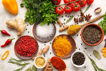 Composition With Aromatic Spices, Herbs And Vegetables On Light Background