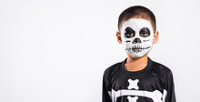 Halloween Kid. Child Man Horror Face Painting Make Up For Ghost Scary, Portrait Of Asian Little Kid Boy Wearing Skeleton Costume Studio Shot Isolated White Background, Happy Halloween Day Concept