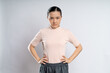 © chajamp - Asian woman angry standing on isolated background.