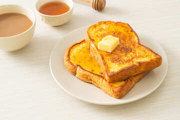 Wall Mural - French toasted with butter and honey